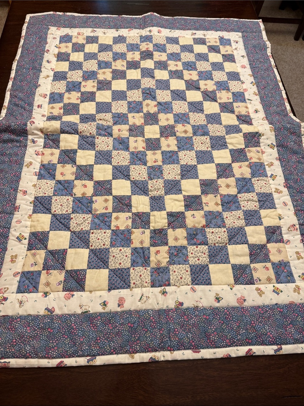 Quilted baby blanket.